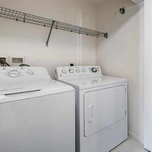 Laundry has never been easier side-by-side washer and dryer units in laundry closet